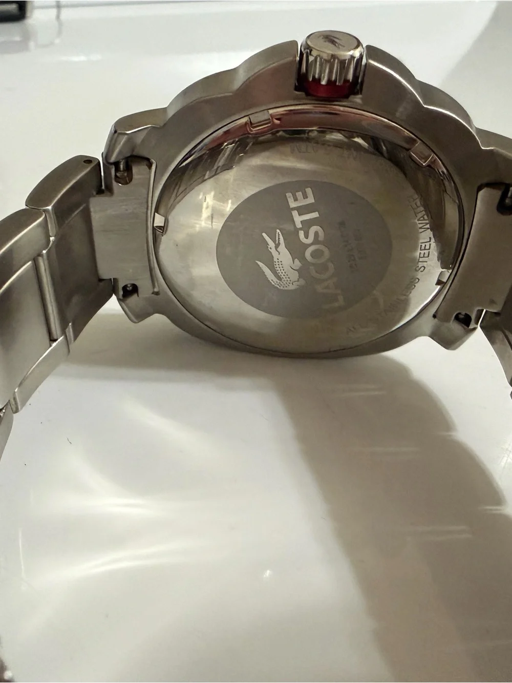 Lacoste Silver Stainless Steel Watch with Black Dial and Red Accents